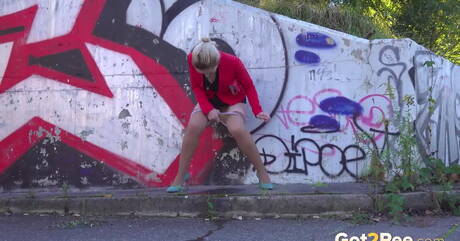Got 2 Pee are excited to present you with a picture gallery showcasing Di Devi in piss action